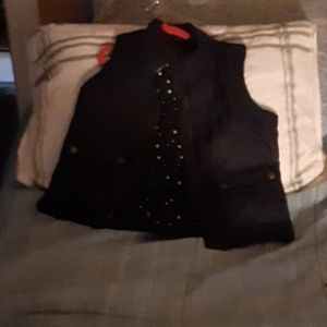 A little girl vest size medium 8